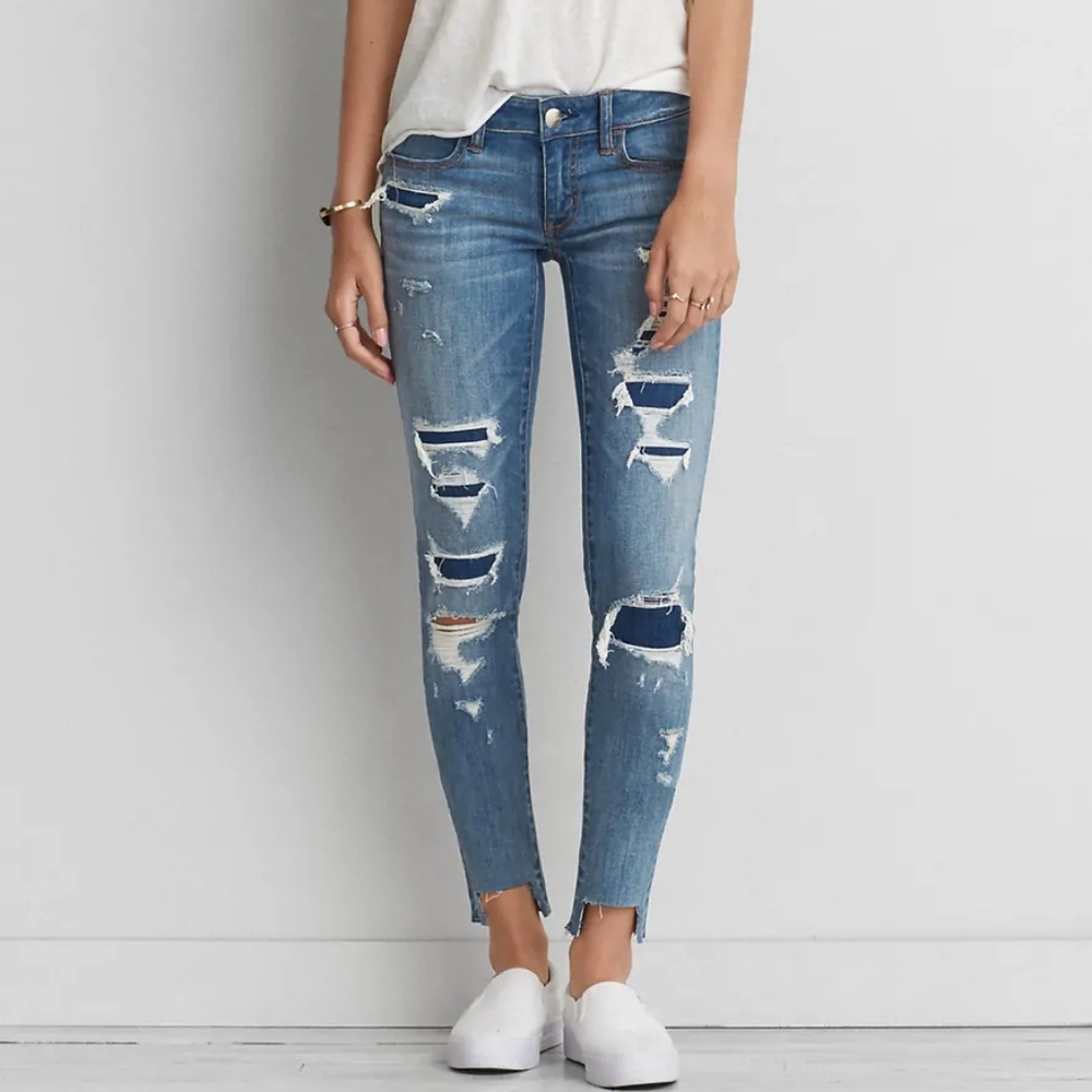 American Eagle  -  Super Low Distressed Patched Jegging With High Cut Hem Sz 00